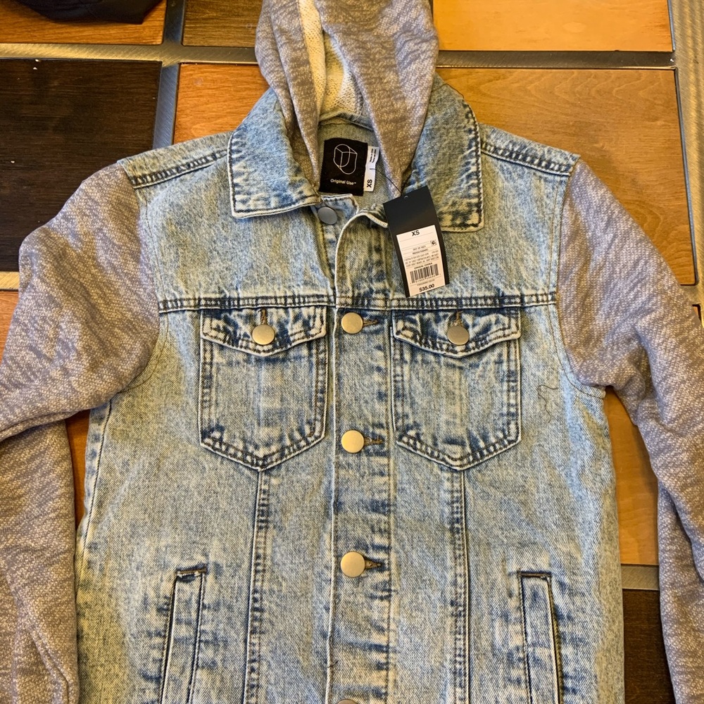 Jean jacket with knit sleeve and hood